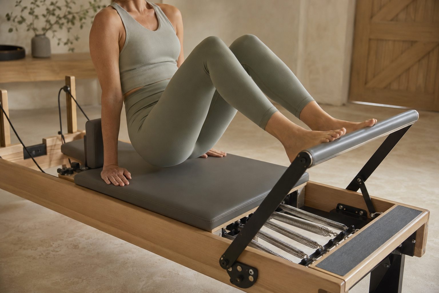 Controlled footwork on a professional Pilates reformer